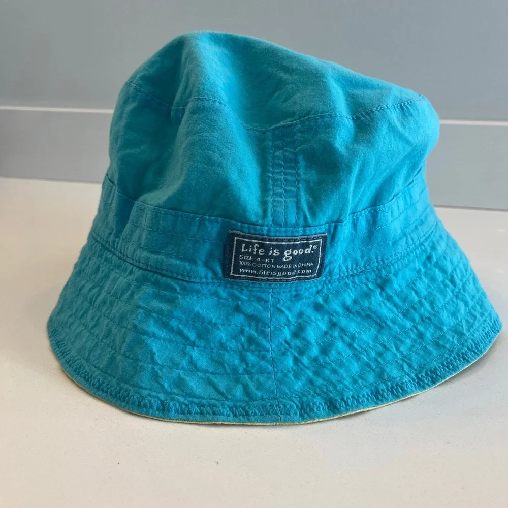 - Life is good reversible 100% cotton kids bucket hat yellow blue